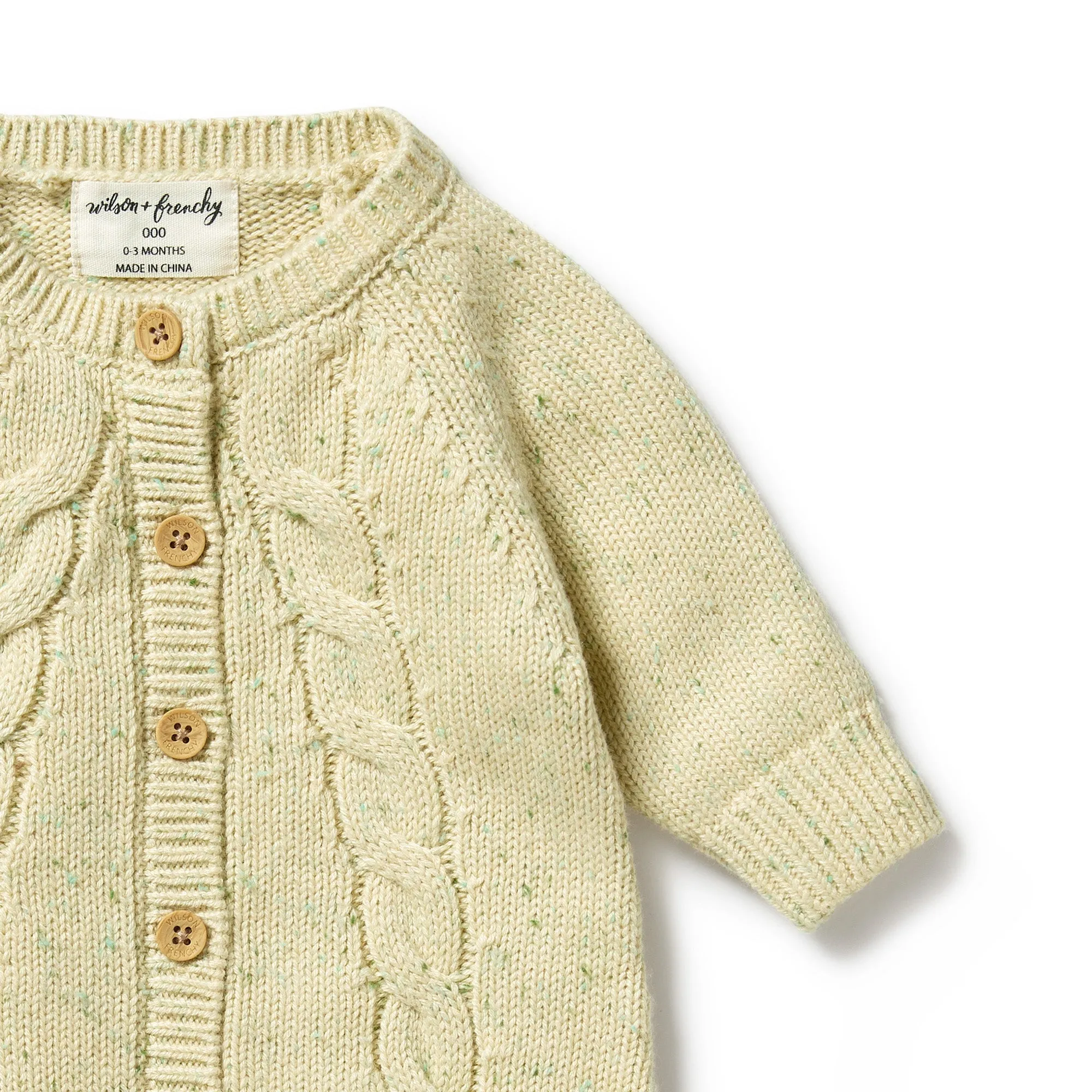 KNITTED CABLE GROWSUIT | ALMOND FLECK